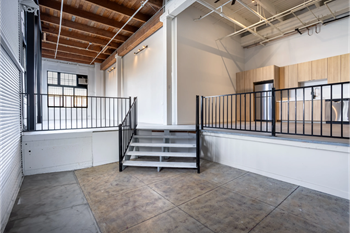 12-14 Foot ceilings with variety of wood finishes